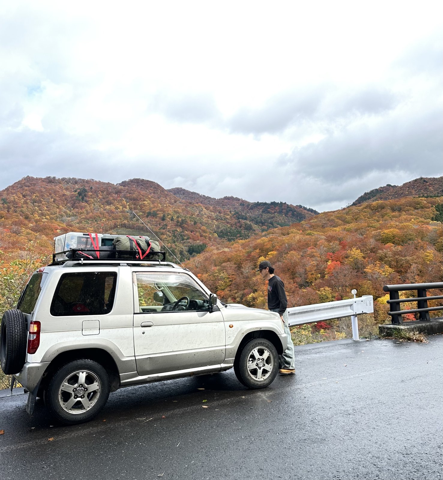 Autumn mountain road trip with jeep